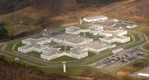 Federal Correctional Institution Manchester is a medium-security federal prison for male inmates. Located in Clay County near Manchester, Kentucky, it is in the eastern part of the state about 75 miles south of Lexington. Inmates are expected to work, and those without a high school diploma must pursue their GED.